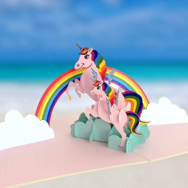 Pink Unicorn Mum And Baby Jumping Over Rainbow Pop Card  |   Animals